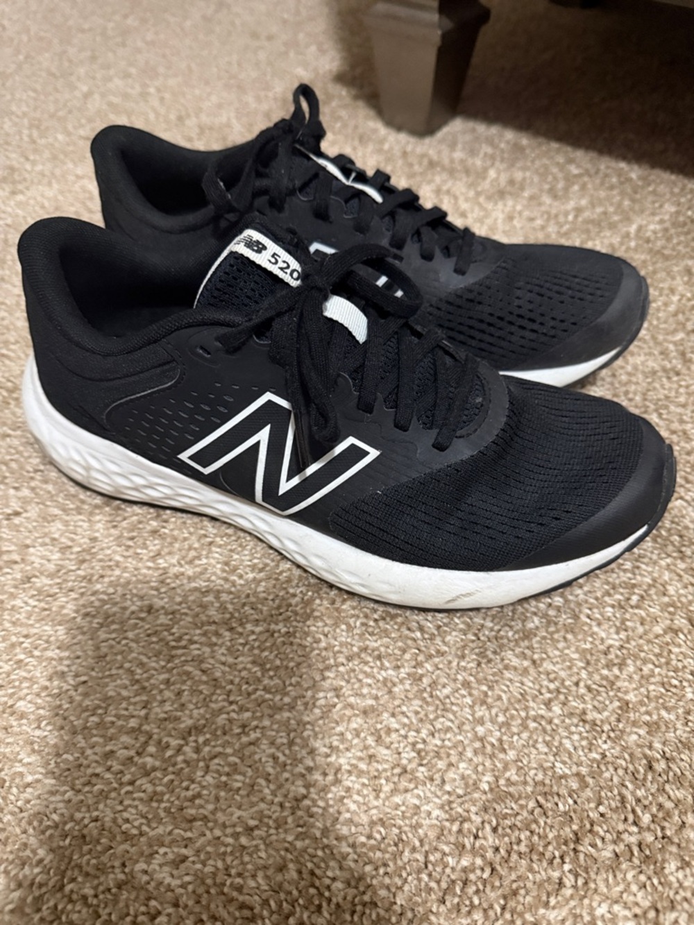 New Balance women’s 520 Black and White Running Sneakers
